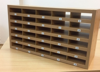 Shelf for storing mobile phones
